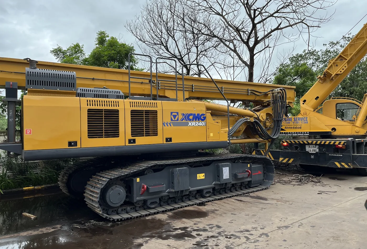 Crawler rig and construction equipment staged for site support