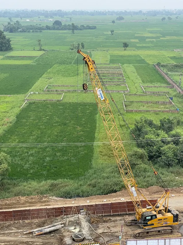 Piling activity near field-side utility and development corridors