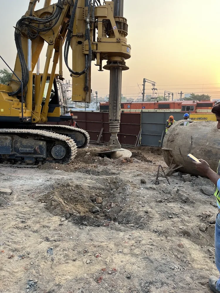 Piling rig working around a foundation pile cap location