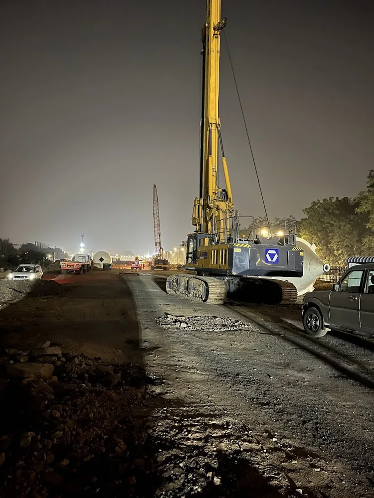 Night piling setup near road and utility access
